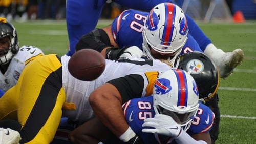 Quintin Morris of the Buffalo Bills fumbles the ball against the Pittsburgh Steelers