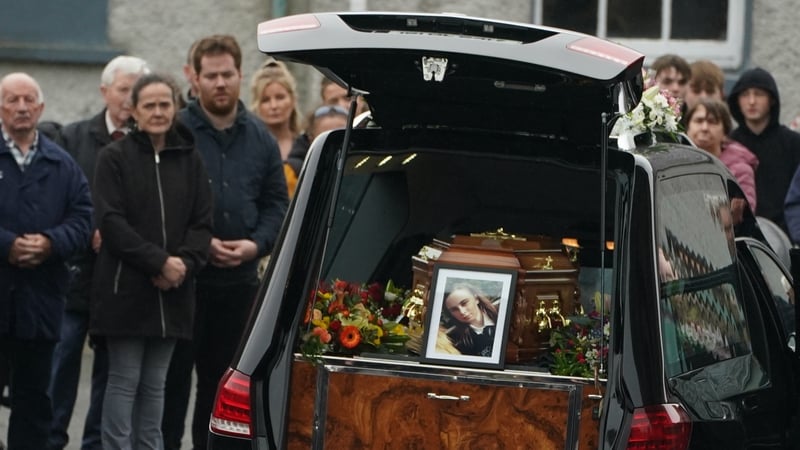 A photo of 14-year-old Leona Harper placed in front of her coffin as it arrives at St Mary's Church, Ramelton