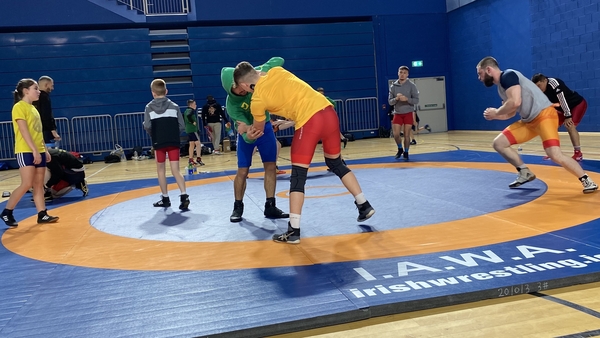 Two wrestlers grapple at today's Irish Open