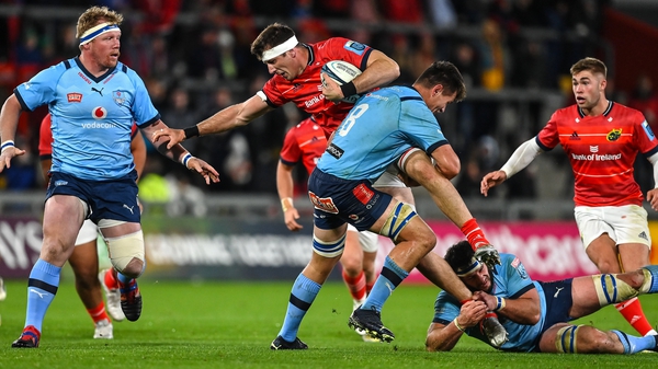 Elrigh Louw and Marcell Coetzee get to grips with Thomas Ahern in Sunday's match at Thomond Park