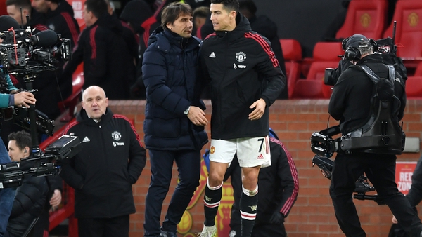 Antonio Conte embraces Cristiano Ronaldo after Spurs' 3-2 defeat at Old Trafford in March