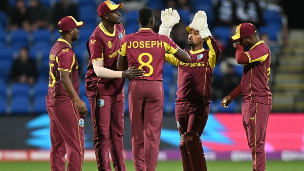 Alzarri Joseph takes the plaudits after taking a Zimbabwe wicket