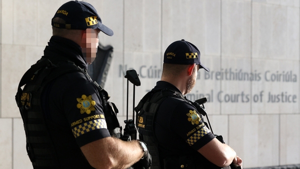 Armed gardaí outside the Special Criminal Court this morning for the third day of the trial of Gerard Hutch