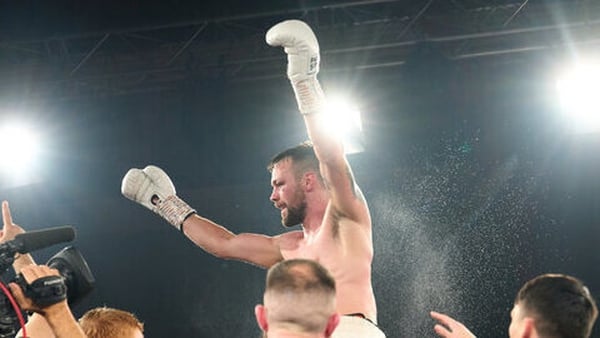 The new IBO light-heavyweight champion - Padraig McCrory - celebrates after the fight