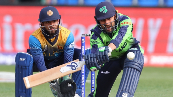 Ireland's Simi Singh plays a shot watched by the Sri Lanka's wicketkeeper Kusal Mendis