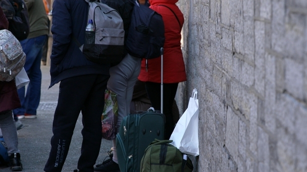Ukrainians queueing outside the Capuchin Centre in Dublin yesterday