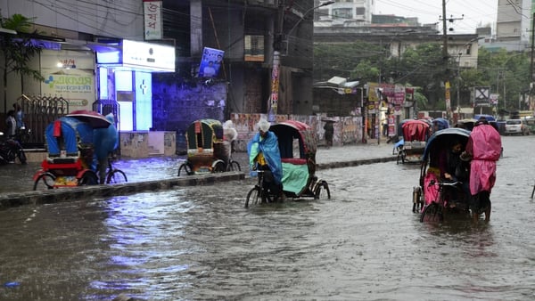Heavy rain swept across Bangladesh, leaving streets in the capital Dhaka flooded