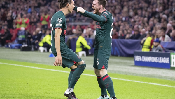 Darwin Nunez (L) and Andy Robertson celebrate the former's goal against Ajax