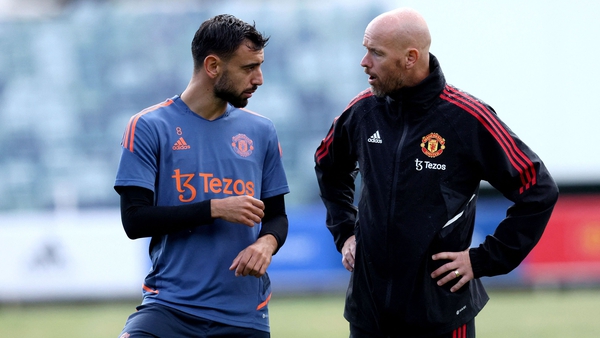 Bruno Fernandes talks to the manager Erik ten Hag during a training session
