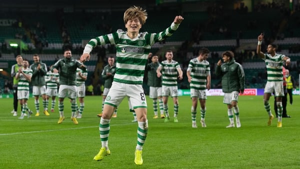 Kyogo Furuhashi celebrates with this team-mates as Celtic left it late to beat Dundee United