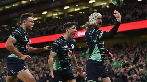 Hugo Keenan and Jimmy O'Brien celebrate with Mack Hansen after Ireland's second try