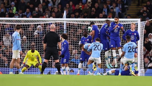 Riyad Mahrez curls a free-kick over the Chelsea wall to open the scoring