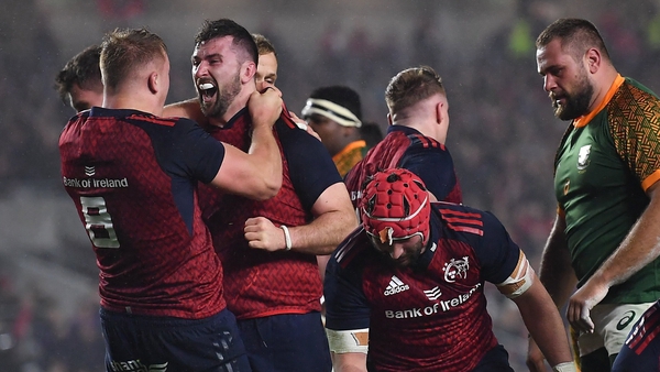 Diarmuid Barron celebrates after Munster's third try
