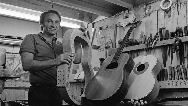 British luthier Tony Zemaitis (1935 - 2002) in his workshop with some of his acoustic guitars, 1972. (Photo by Michael Putland/Getty Images)