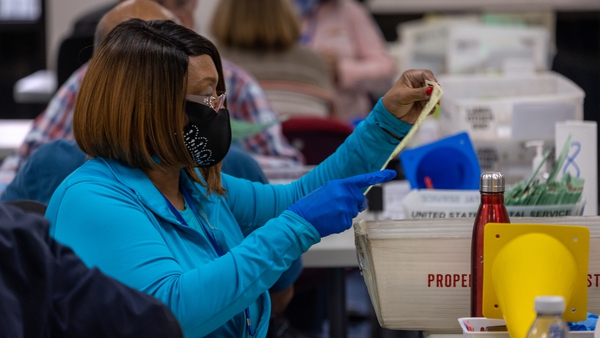 Election workers sort ballots at the Maricopa County Tabulation and Election Centre in Phoenix, Arizona