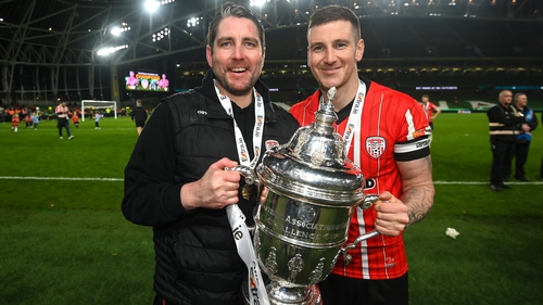 Manager and captain - Ruaidhri Higgins and Patrick McEleney pose with the FAI Cup following the victory at Lansdowne Road