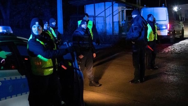 Police block a road near the site of the missile strike in Przewodow, Poland. Photo: Jakub Orzechowski/Agencja Wyborcza.pl via Reuters