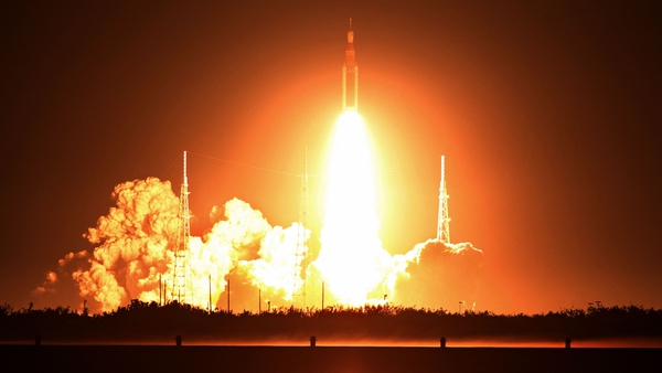 The huge rocket blasts off on its way to the Moon's orbit