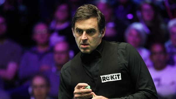Ronnie O'Sullivan squeezed into the second round