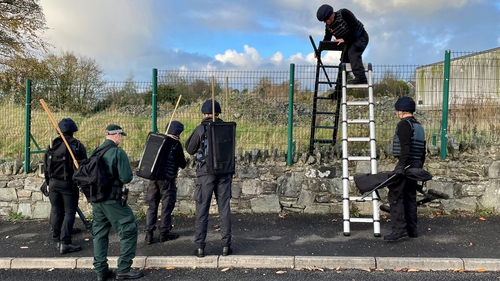 Army search teams assisted by the PSNI at the scene