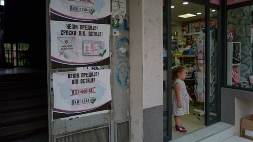 Posters opposing reciprocal measures on car registration plates and identity documents seen in August in Mitrovica, Kosovo