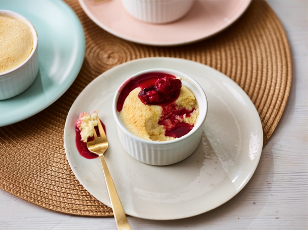White chocolate soufflés with raspberry sauce