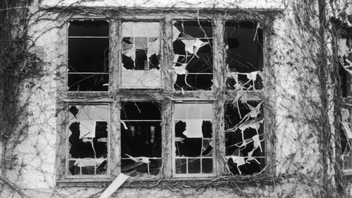 Damaged windows at Kilteragh, Sir Horace Plunkett's house outside Dublin, which was burned down by anti-Treaty forces in February 1923. Photo: Walshe/Topical Press Agency/Hulton Archive/Getty Images