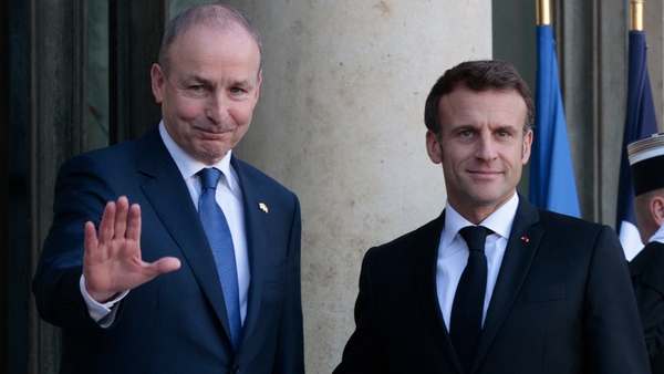 Micheál Martin is welcomed to the Élysée Palace by French President Emmanuel Macron