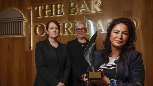 Chair of The Bar of Ireland, Sara Phelan, and Chair of the The Bar of Ireland's Human Rights Committee, Aoife O'Leary BL, presenting the award to Mags Casey of The National Traveller Mental Health Network