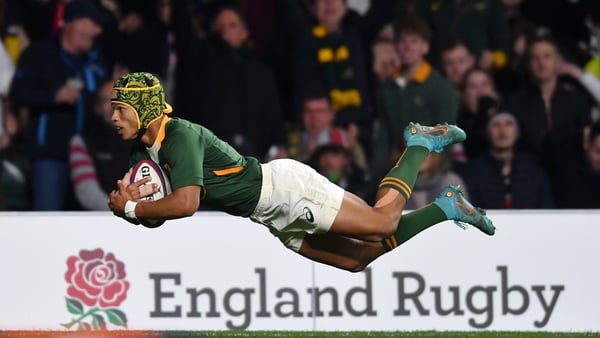 Kurt-Lee Arendse of South Africa goes over to score his side's first try
