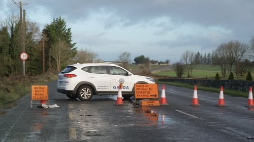 The road at the crash site is closed for examination by Garda Forensic Collision Investigators