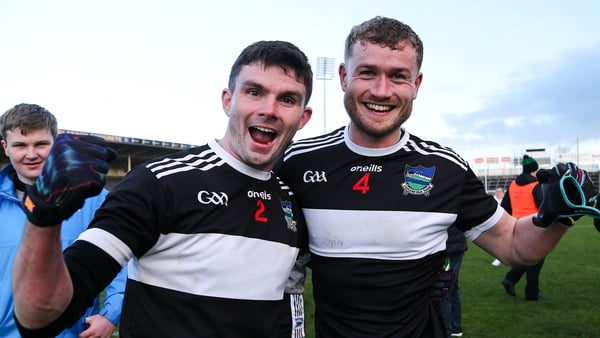 Newcastle West players Michael O'Keeffe, left, and Brian O'Sullivan celebrate their win