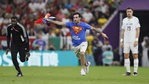 Man with rainbow flag invades pitch during World Cup