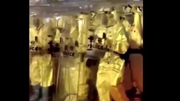 Footage on social media shows dozens of riot police in all-white pandemic gear