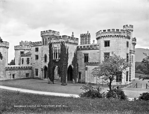 A black and white photo of a castle