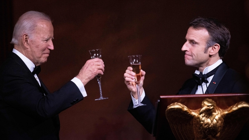 French President Emmanuel Macron toasts US President Joe Biden