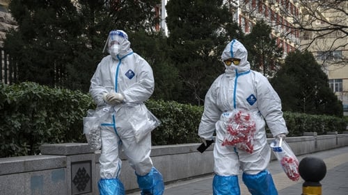 Epidemic control workers wear PPE to prevent the spread of Covid-19 Beijing