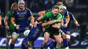 Kieran Marmion of Connacht is tackled by Dewaldt Duvenage, left, and Niccolo Cannone of Benetton