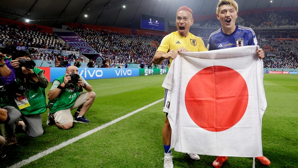 Yuto Nagatomo (L) and Ritsu Doan celebrate Japan's victory over Spain on Thursday