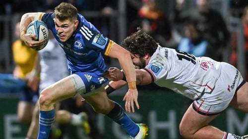 Garry Ringrose evades the tackle of Tom O'Toole on the way to scoring his second try