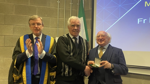 President Michael D Higgins presented Fr McVerry the McAuley Medal from Mary Immaculate College