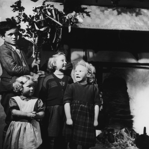 Children in Ireland celebrate St Stephen's Day or 'Wren's Day' on 26th December by processing from house to house with a branch of holly, circa 1955. (Photo by George Pickow/Three Lions/Hulton Archive/Getty Images)