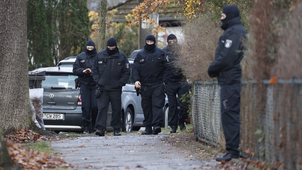 Officers at the scene of a raid in Berlin this morning