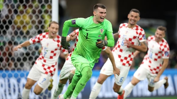 Dominik Livakovic and his Croatia team-mates celebrate a second consecutive penalty shootout success