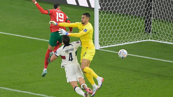Morocco's forward Youssef En-Nesyri scores the winning goal
