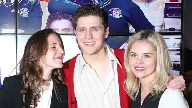 Llewellyn with Derry Girls co-stars Louisa Harland (L) and Saoirse-Monica Jackson (Niall Carson/PA)