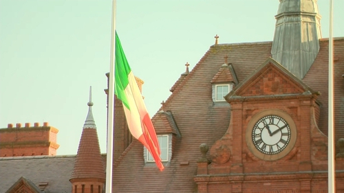 The national flag at half-mast outside McKee Barracks yesterday