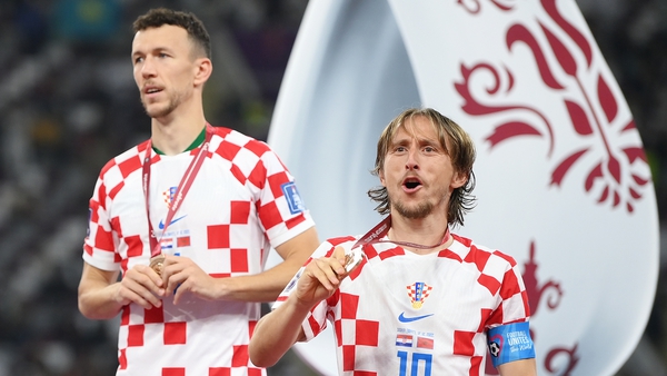 Luka Modric and Ivan Perisic clutch their bronze medals
