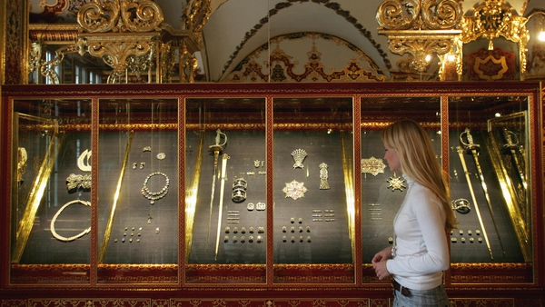A visit looks at precious objects in the jewel room of the Green Vault in Dresden (File picture)