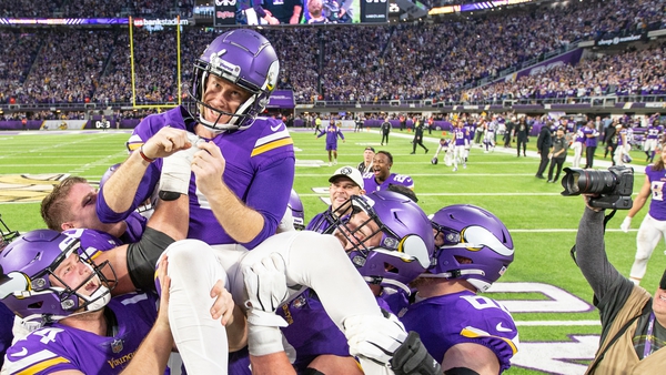 Minnesota Vikings place kicker Greg Joseph (1) is lifted on his team-mates shoulders after kicking a game-winning field goal